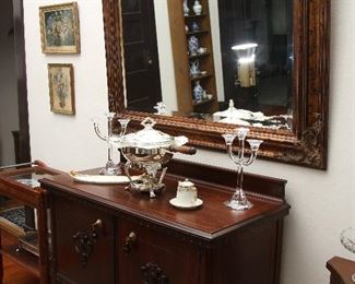 Server showing large silver plate chafing dish