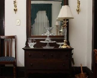 Dresser with attached mirror.