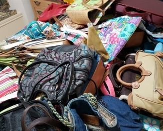 About 50 New purses most with tags