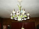 Light Fixture in Family Room. Although available for sale throughout the sale, fixture will be lowered at the end of day or end of sale, by appointment