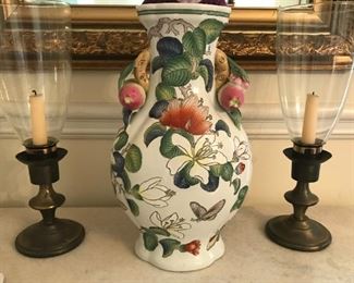 Floral ceramic vase marked "Andrea by Sadek", pair of candlesticks with hurricane covers