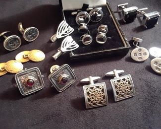Sterling cufflinks. The Menorah cufflinks shown in cente are not available. Far back right: smoky quartz cuff links.