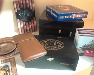 Some of the cigar related items. Two humidors not snown.