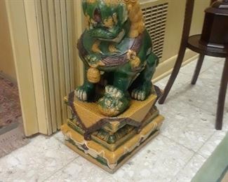 One of a pair of large floor size temple guard dogs.