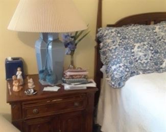 One of several bedroom sets. Blue and white Ralph Lauren bedding for queen.