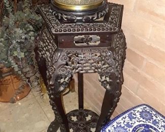 Ornately carved stand Chinese imperial style.