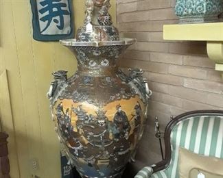 Monumental Japanese Satsuma urn with foo dog finial on lid. Excellent. Circa early 20th century. More than 6' high. Must see. Stripped chair is one of a pair. Comfortable and in excellent condition. Priced to sell.