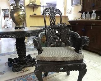 Cared Japanese chair with dragon arm rests. Priced to sell, as are the other carved pieces. Brass and bronze vase with dragons on tale.