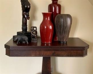 Flip-Top Table with Tooled-Leather inset; Glazed Ceramic Urns; African Figures