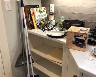 Cook books and cleaning supplies
