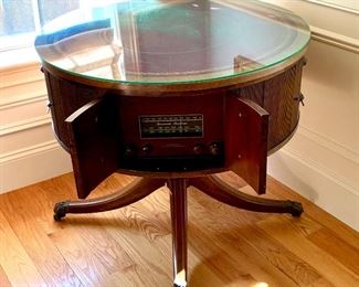 Brunswick Panatrope 1941 #14824. Complete with a radio, phonograph and auxiliary capabilities.  Made from Mahogany with a red leather top. 