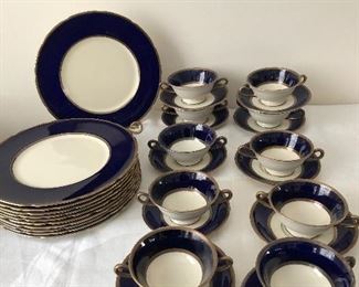Silver Lenox dinner plates and cream soup bowls