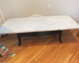 MARBLE TOP WITH CAST IRON BASE.