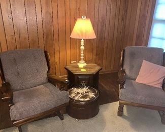 2 matching chairs with end table. One chair needs new cushions