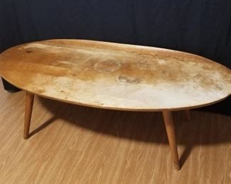 "Surfboard" maple coffee table by Conant-Ball.  Needs refinishing, but it's solid.