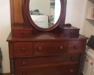 Antique Solid American Burly Cherry five drawer chest with large oval mirror and pair of gloves boxes