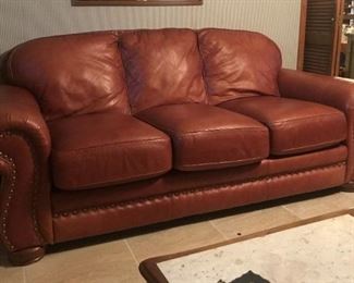Lane leather sofa with brass nail head trim