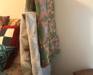 More quilts and wall mount quilt rack or display.