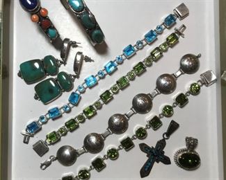 Modern Native American bracelets, pendants and earrings.