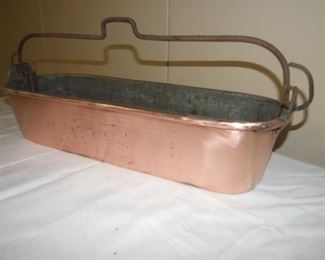 Large shiny copper fish steamer