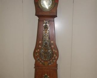 Banjo shaped longcase clock decorated with flowers