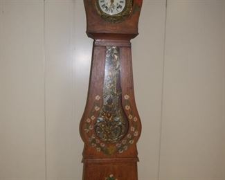 Banjo shaped longcase clock decorated with flowers