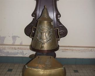 Brass fountain on ornate oak back