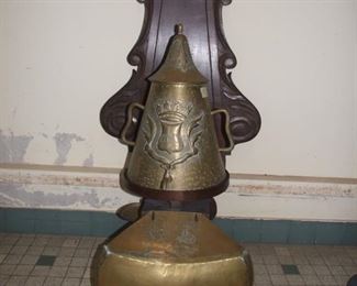 Brass fountain on ornate oak back