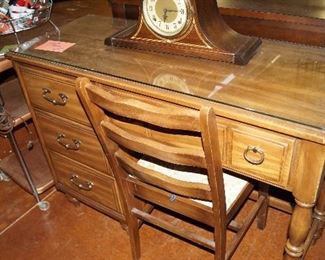 small desk with chair, clock
