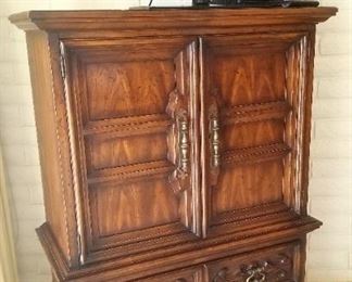 Gentleman's chest and 40 in. TV