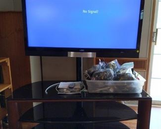 Vizio 47 Inch TV with Console and Box of Misc. Cords