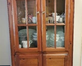 Wooden cabinet with glass doors 