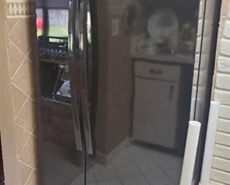 Whirlpool side by side fridge with ice maker