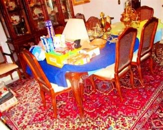 Mahogany Dinning Room  Table with six chairs.    10 x 13  Oriental Persian Carpet  hand made vegetable dye.  Some wall art