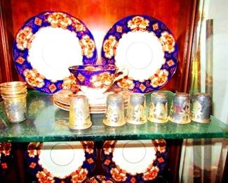 Royal Albert  Bone China  Heirloom Pattern .. Full place settings. Small sterling cups.