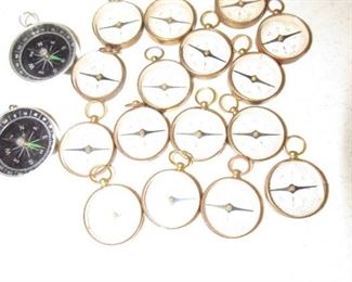 Vintage brass compasses