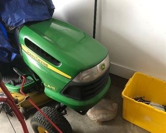 Great condition John Deere tractor mower 42” cutting span