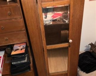 Antique cabinet with mirror