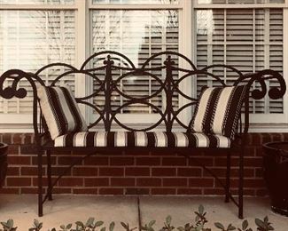 Wrought iron outdoor bench; 2 cement planters