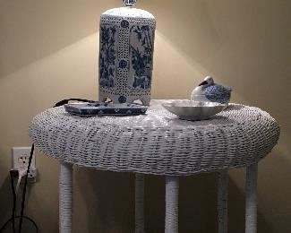 Wicker occasional table; blue & white lamp and various dishes