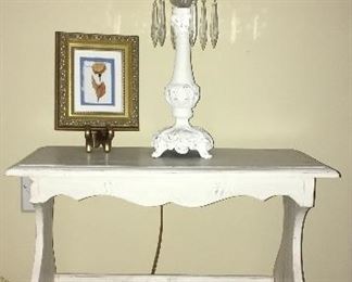 Painted wood magazine rack; picture; painted cast-iron lamp