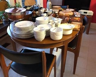 Teak dining table with four chairs