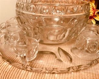 beautiful punch bowl with underplate cups and ladle