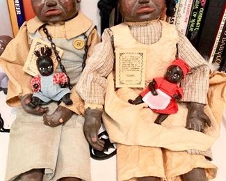 Black Americana carved dolls by Maynard Arnett.