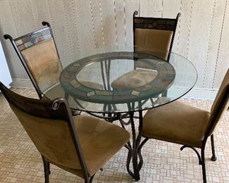 Glass and iron table and 4 chairs