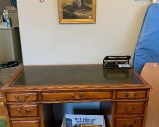 Wood desk with leather inserted top