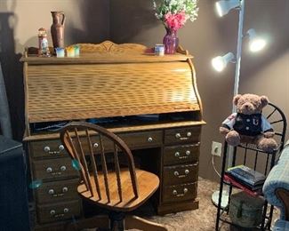 Oak roll top desk, oak desk chair, floor lamp and small shelf