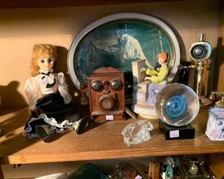 Collection of telephone knickknacks, including some Bell items