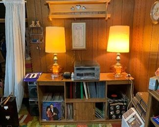 Lots and lots of albums, Country and children. Turntable cassette player AM/FM radio with two speakers, vintage table lamps