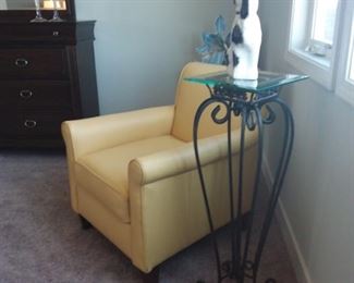 Yellow accent chair, plant stand